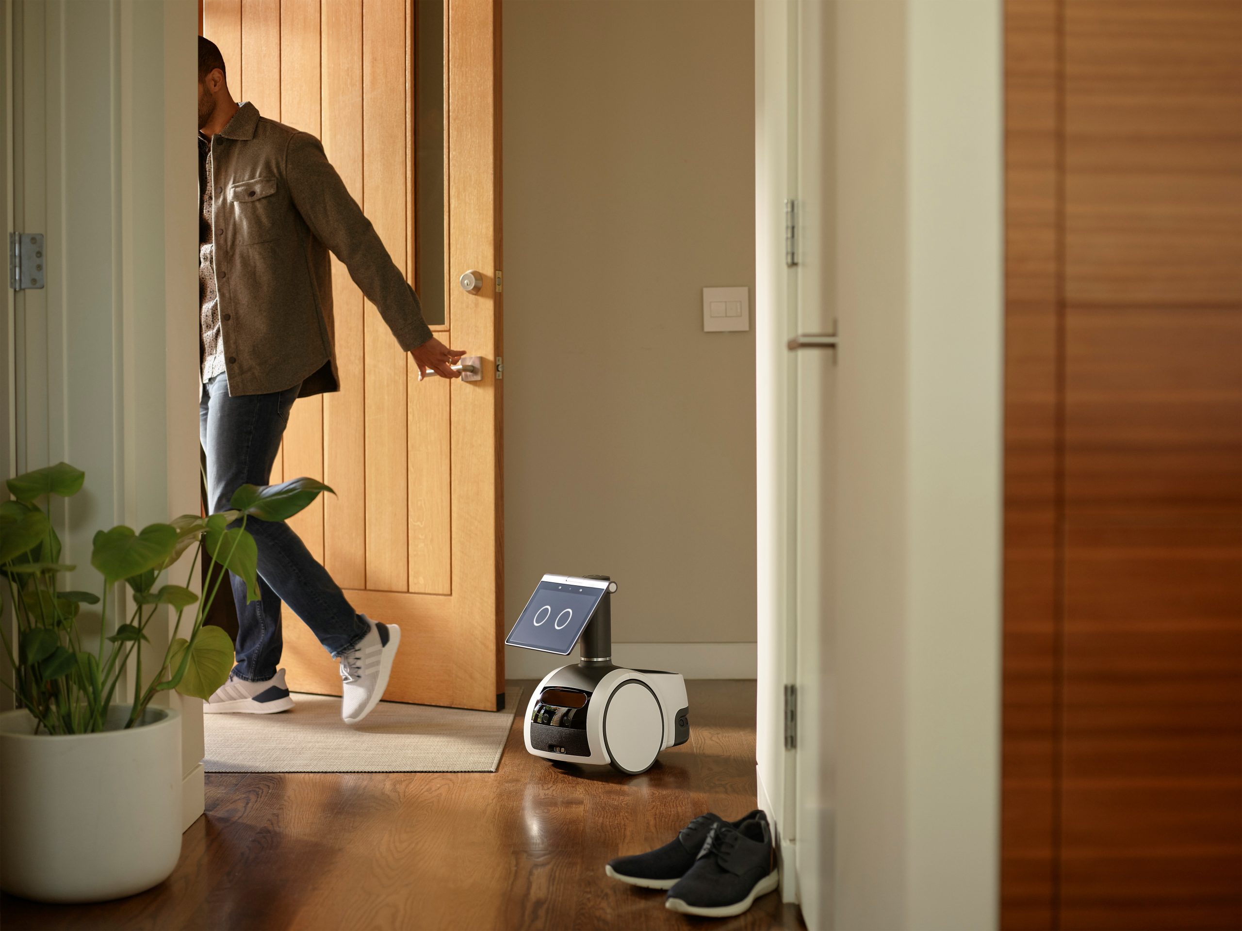 Amazon launches robot to roll around house, Disney resort voice assistant