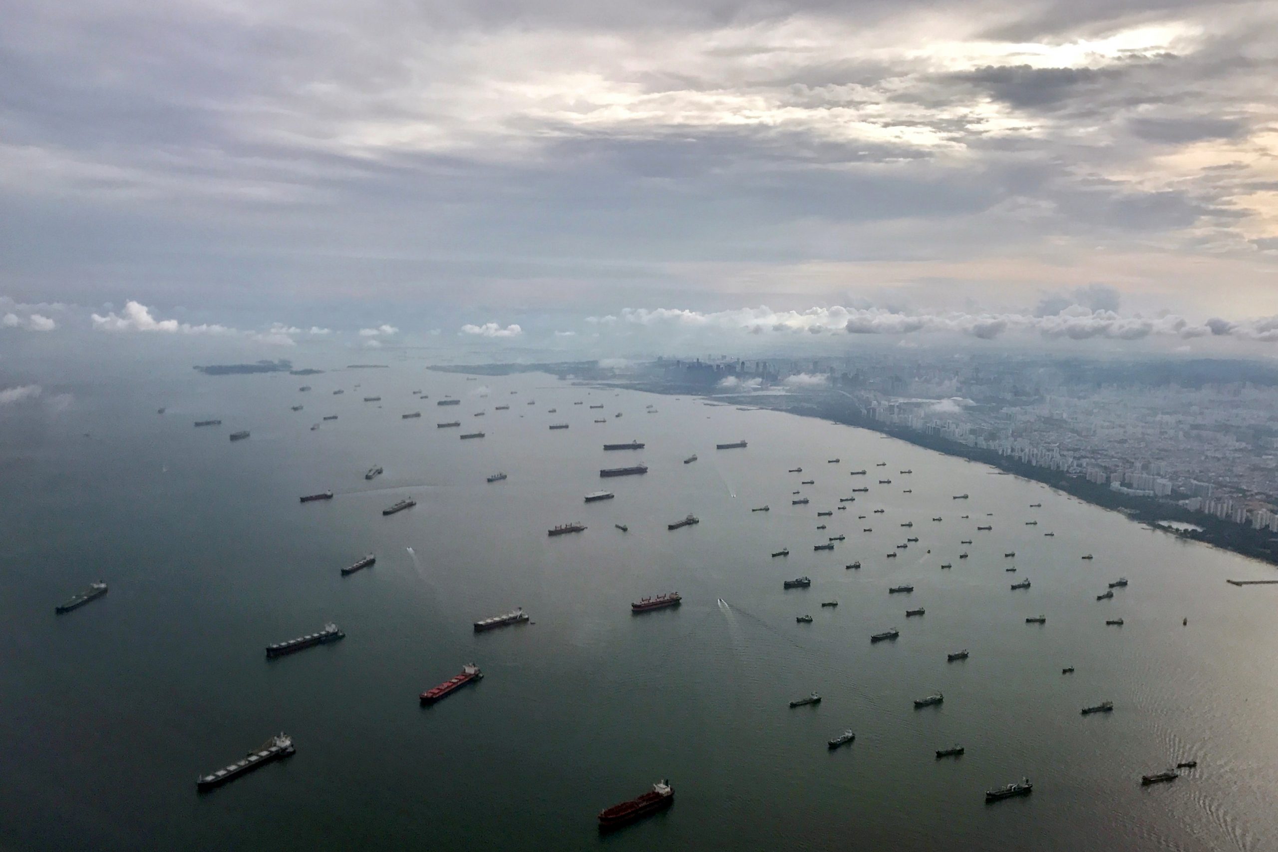 Shipowners make payoffs to free vessels held by Indonesian navy near Singapore- sources