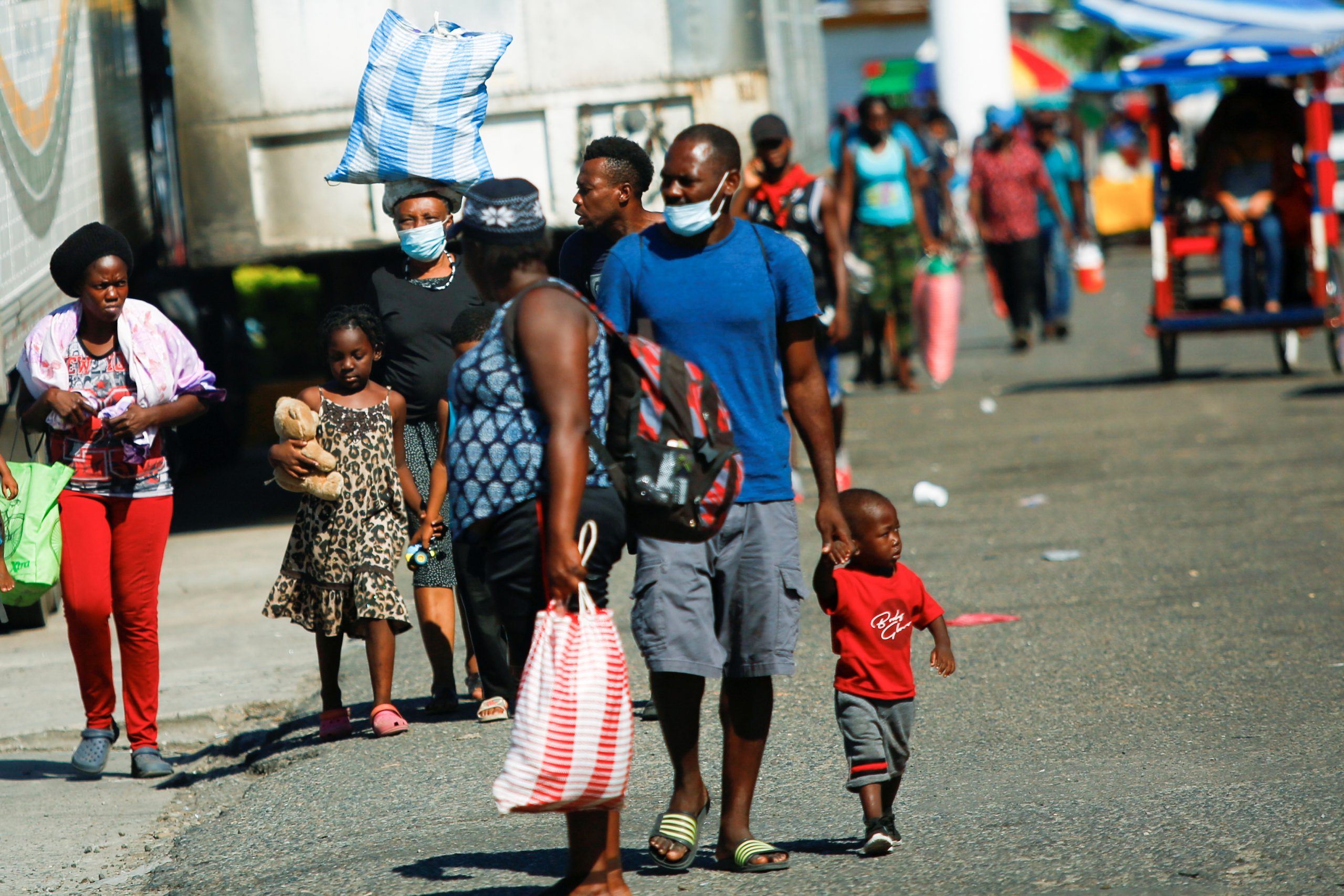 Haitian migrants sue U.S. government, claiming physical and verbal “abuses”