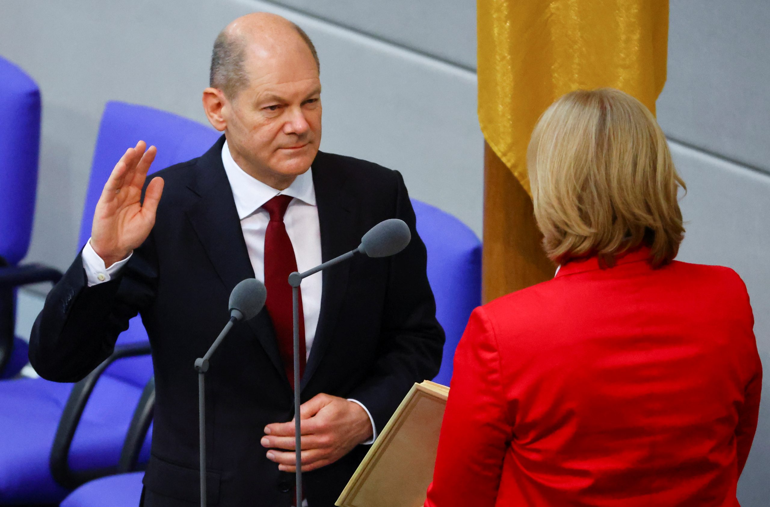 Scholz takes over as German chancellor, ending Merkel era