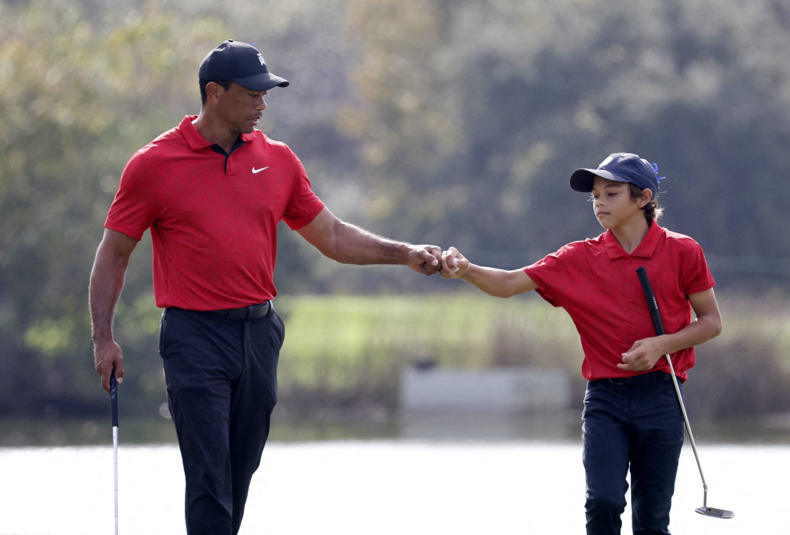 Tiger Woods finishes second alongside his son in first tournament since car crash