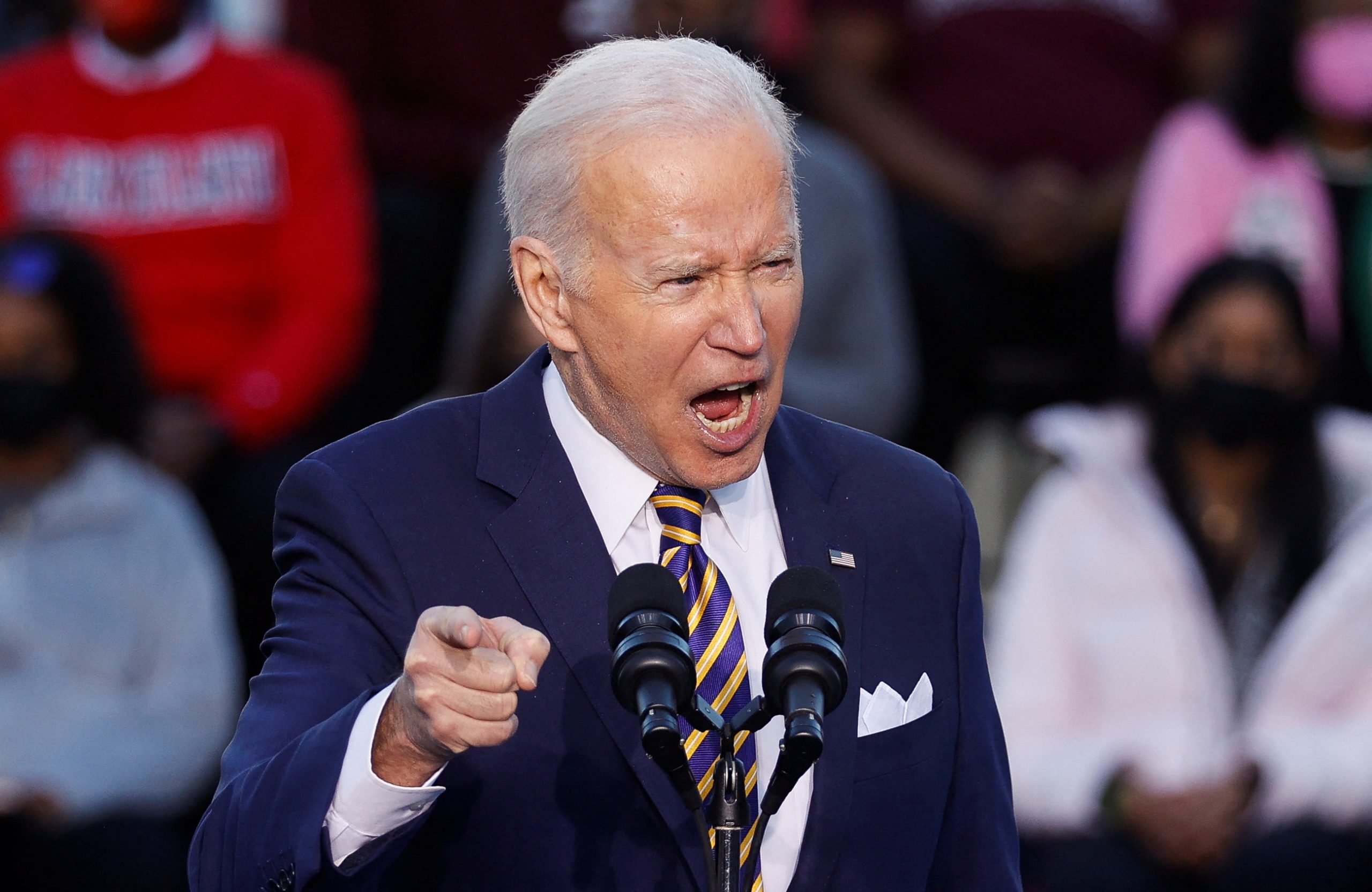 Biden supports ending filibuster in racially charged speech