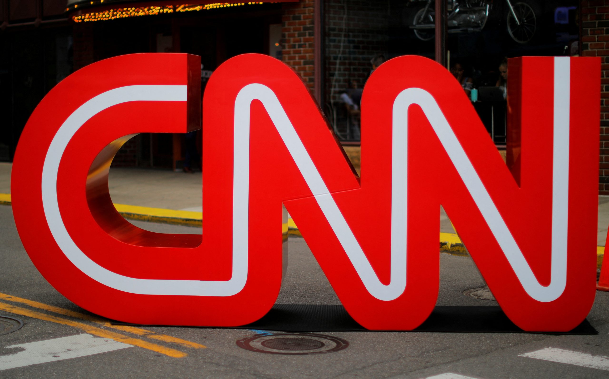 CNN ends probe into Cuomo issues, executive Gollust quits