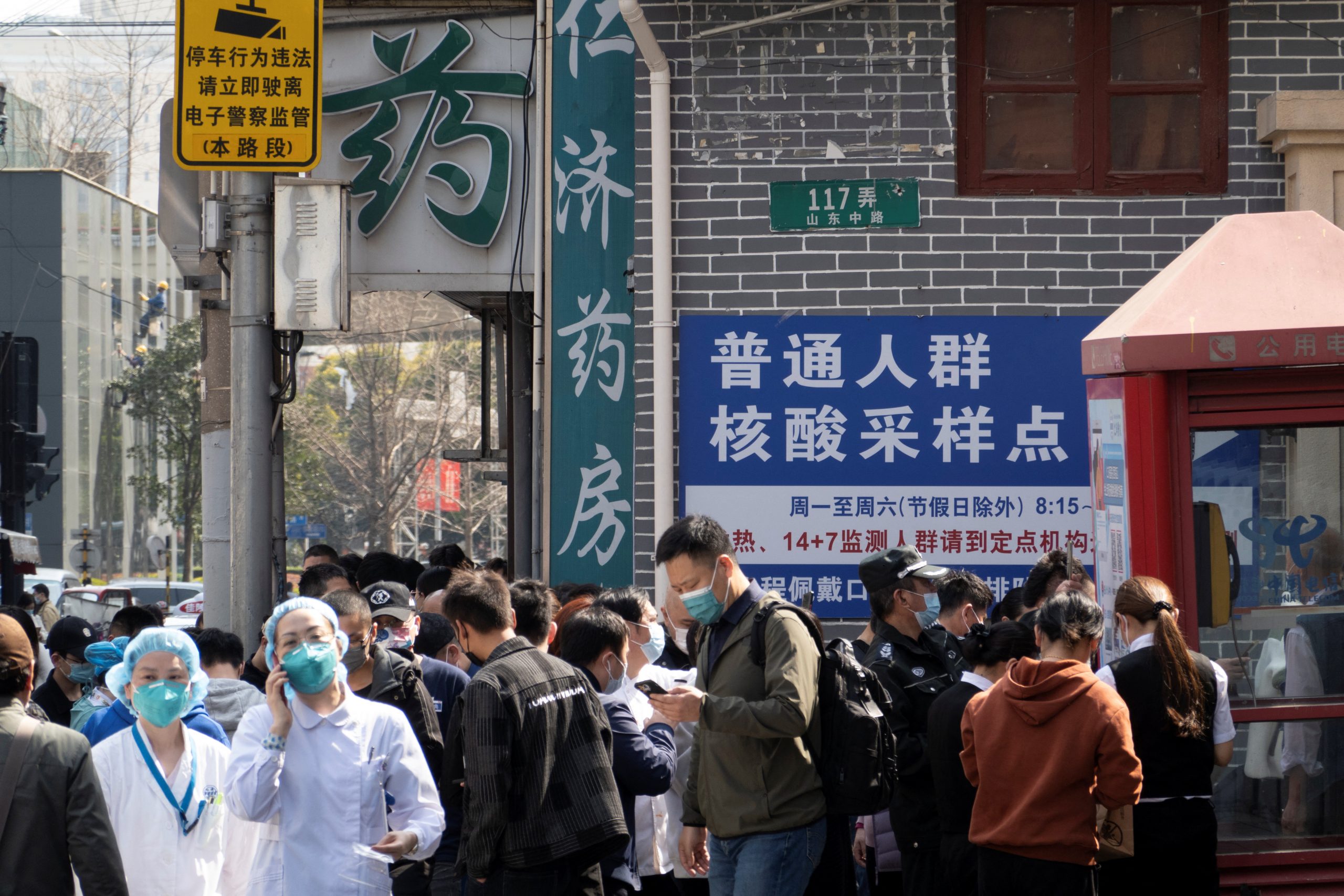 China orders massive lockdowns as daily cases of symptomatic COVID more than triple