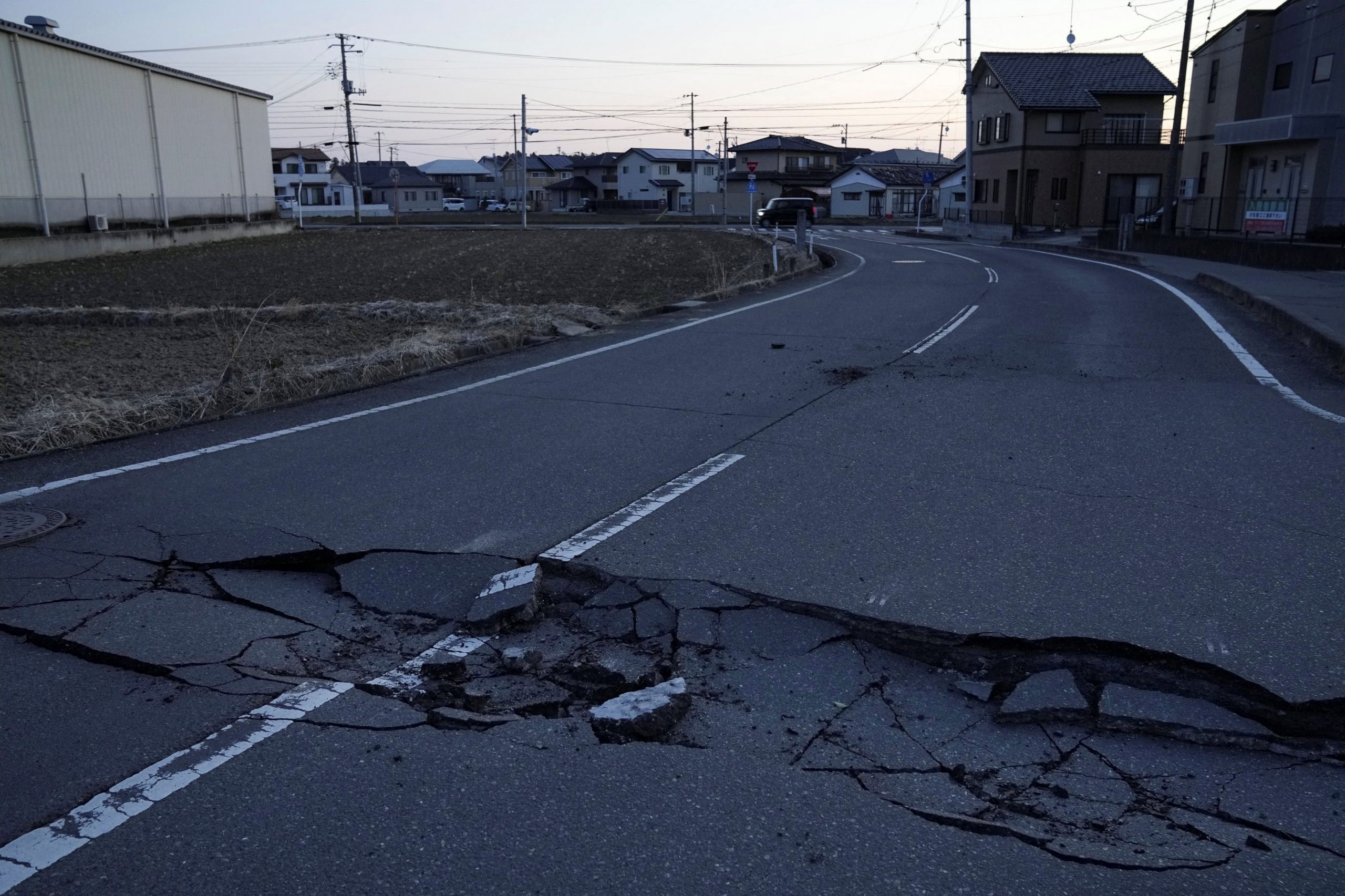 Quake in Japan kills four, halts factories, cuts power to thousands of homes