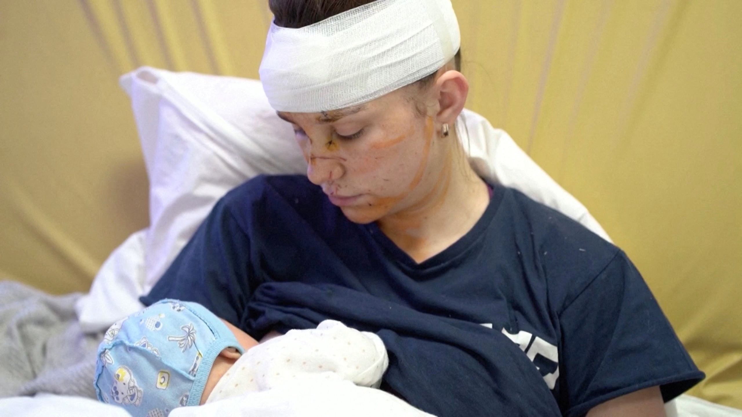 Ukrainian mother shielded baby from blast as civilian toll mounts