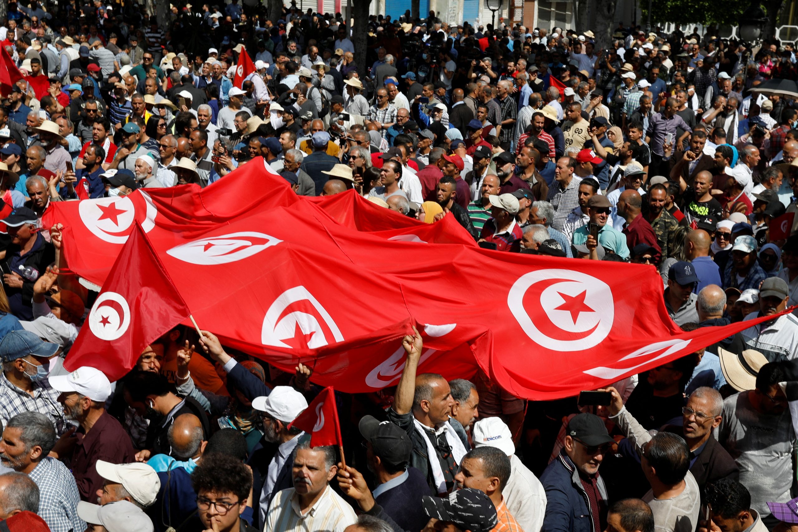 Thousands in Tunisia protest against president, demand democratic return