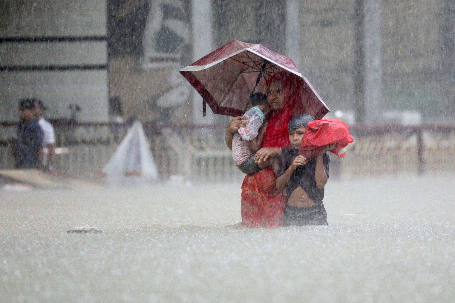 Millions stranded as floods ravage India, Bangladesh