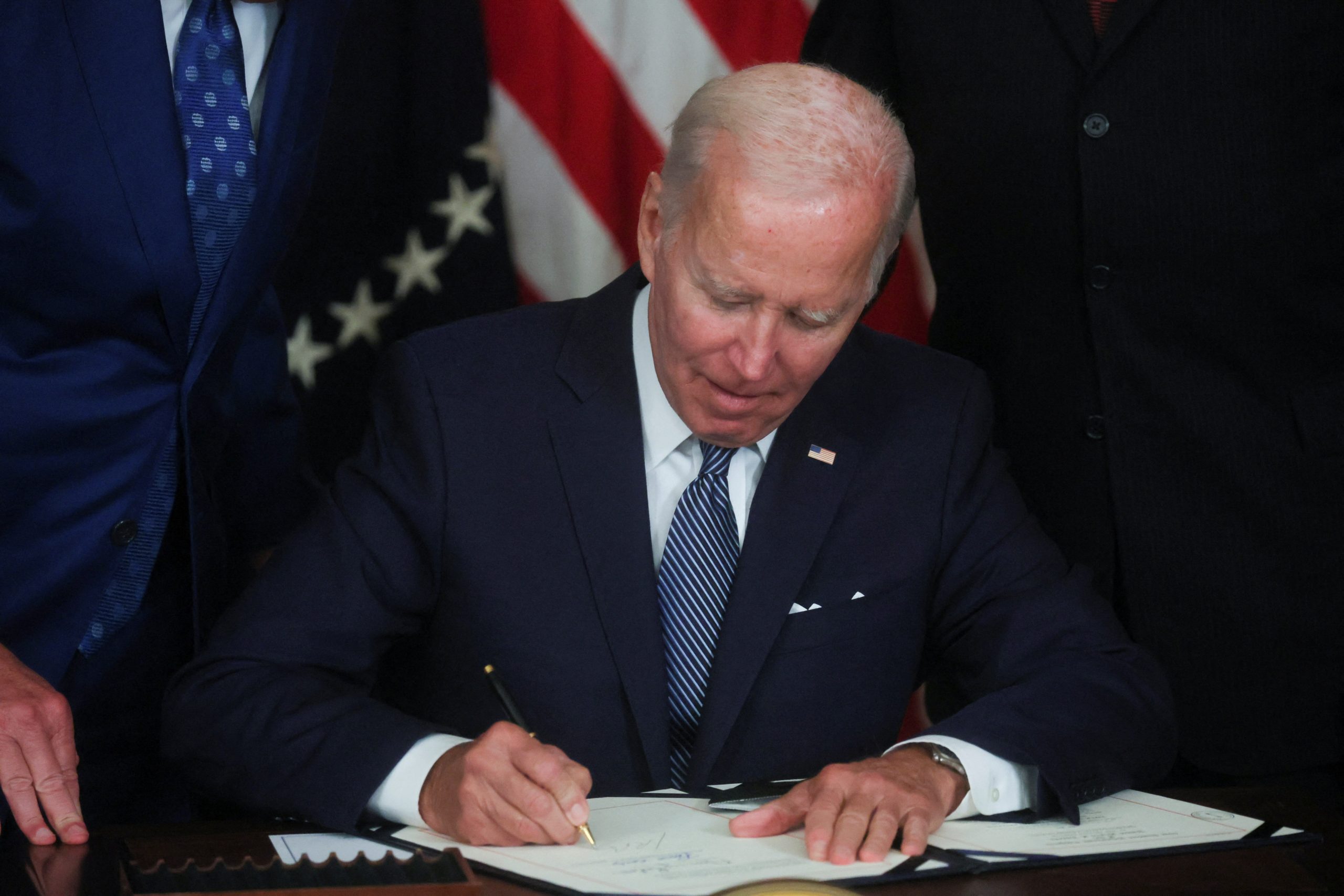 Biden signs Inflation Reduction Act that likely won’t reduce inflation