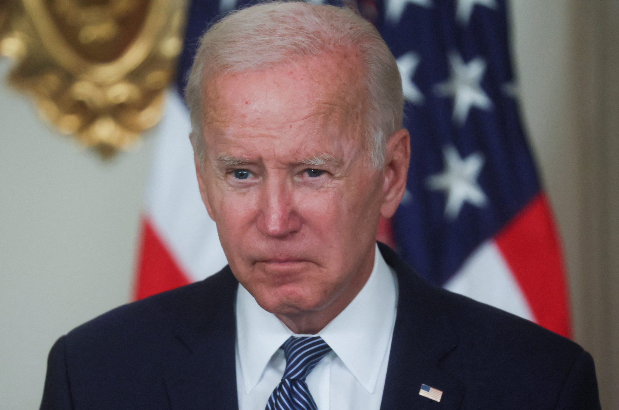 Biden approval falls, holding near low end of his presidency