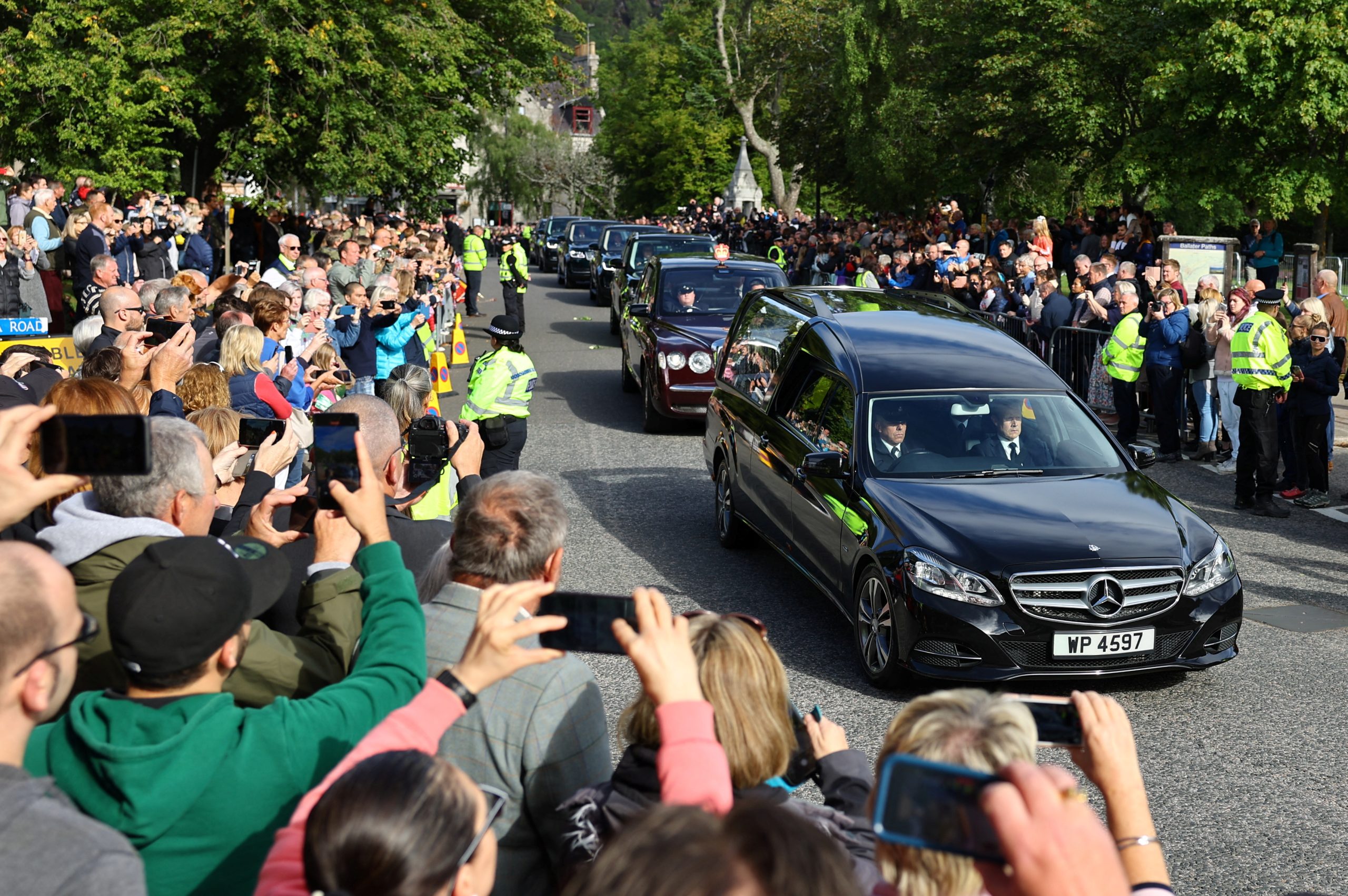 Queen Elizabeth carried to Edinburgh as royal family shows united front in grief