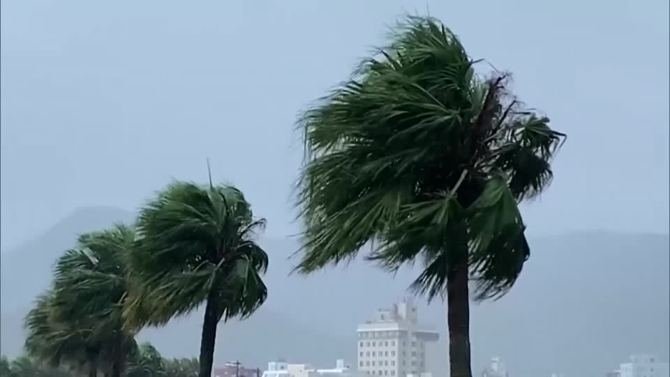 Typhoon batters western Japan with record rain, killing two