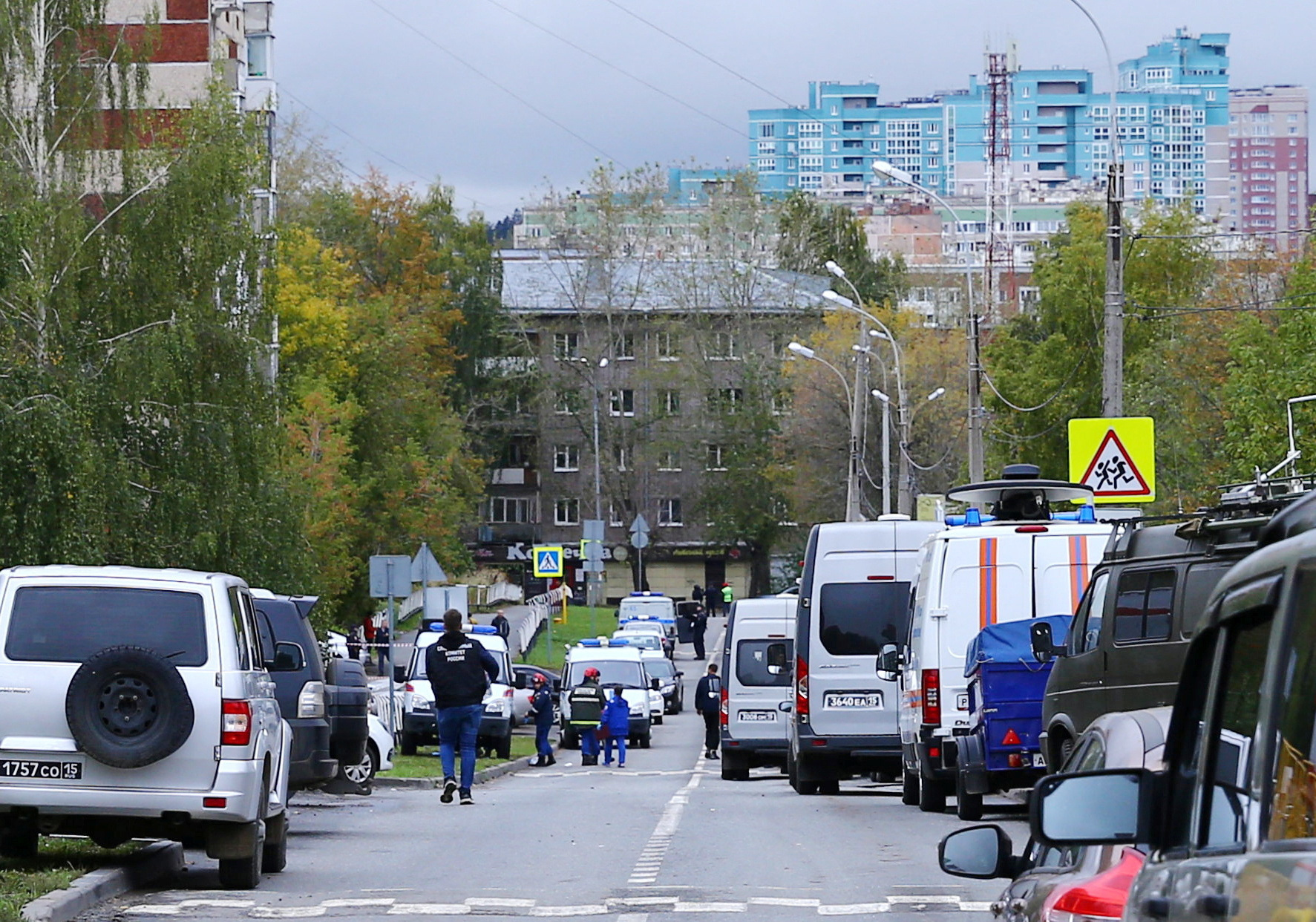 Swastika-wearing ex-pupil kills 15 in Russian school shooting