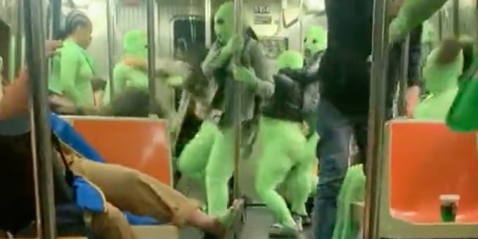 Bizarre video shows gang of women dressed in green bodysuits attack, rob teens on NYC subway