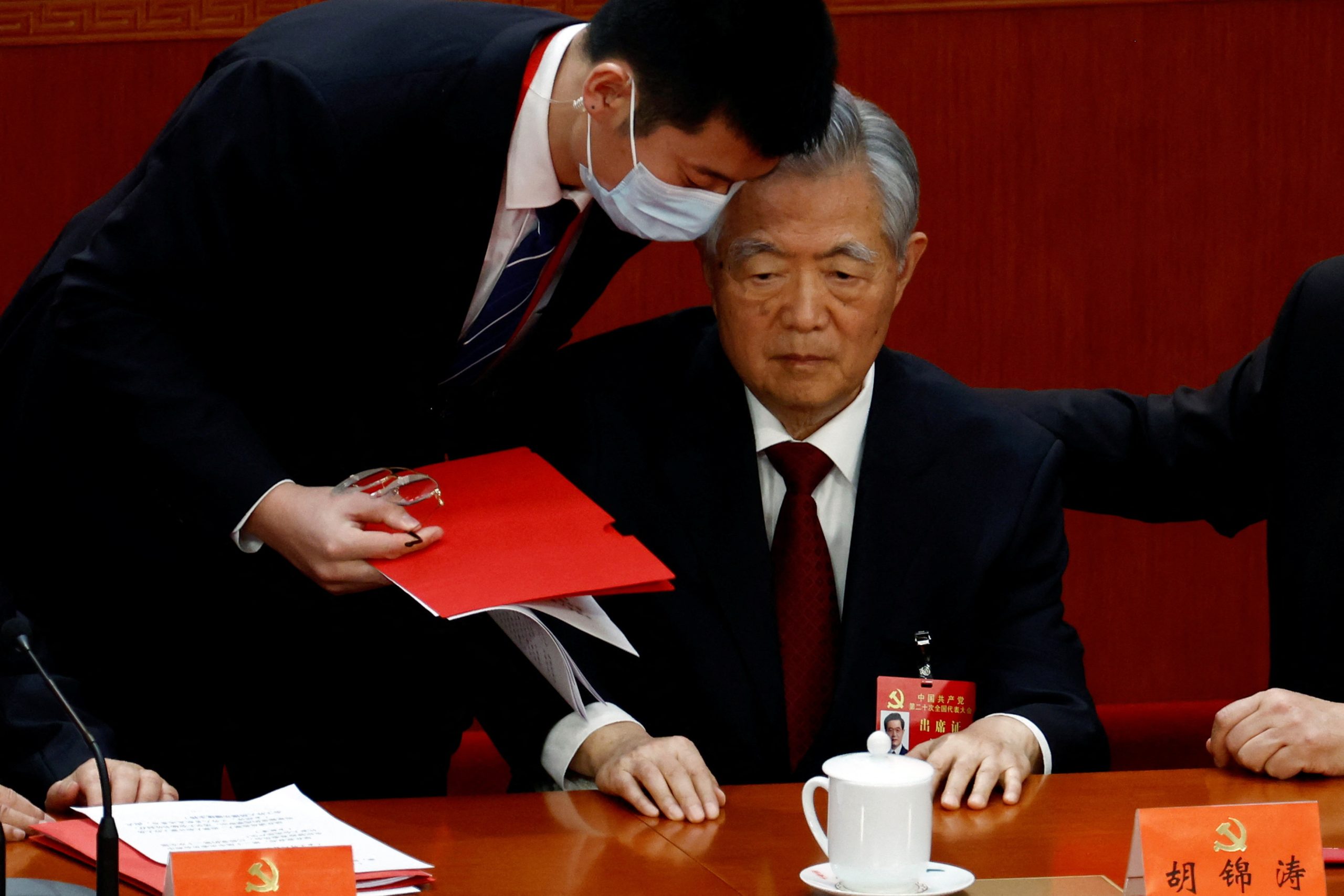 Chinese ex-President Hu Jintao escorted out of party congress