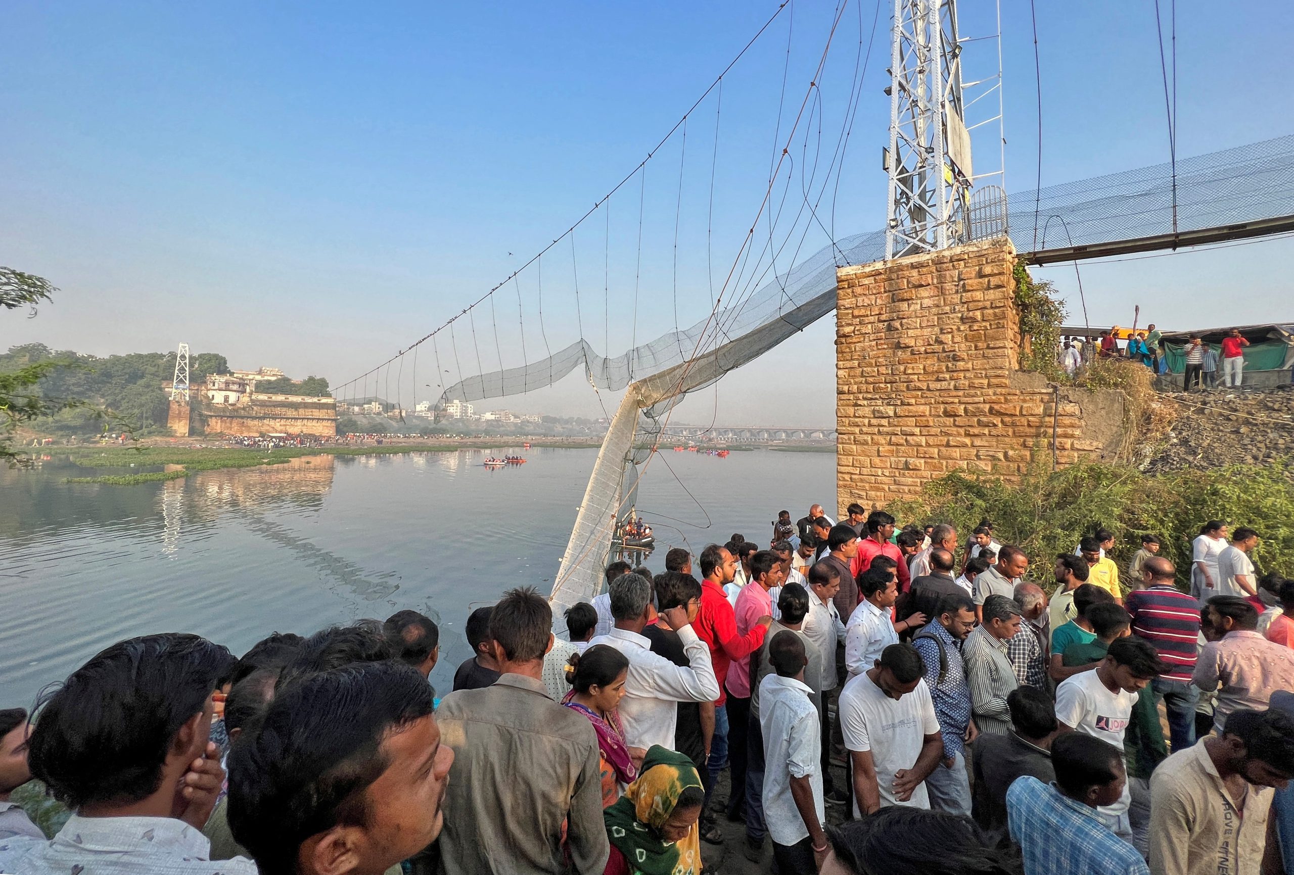 India bridge collapse toll jumps to 134, police detain nine people