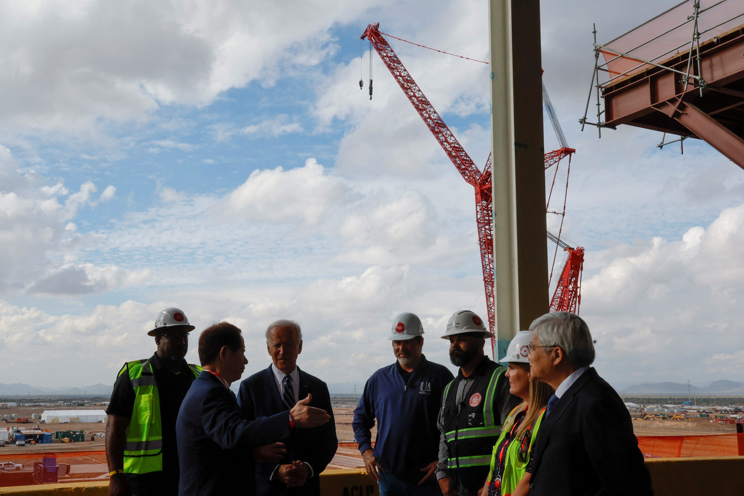 Biden hails Arizona chip plant, avoids border