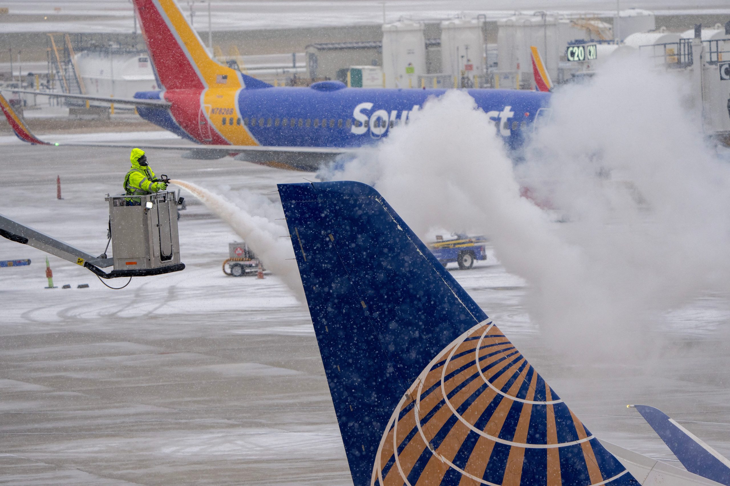 ‘Travel insanity’: passengers stranded throughout US by winter storm