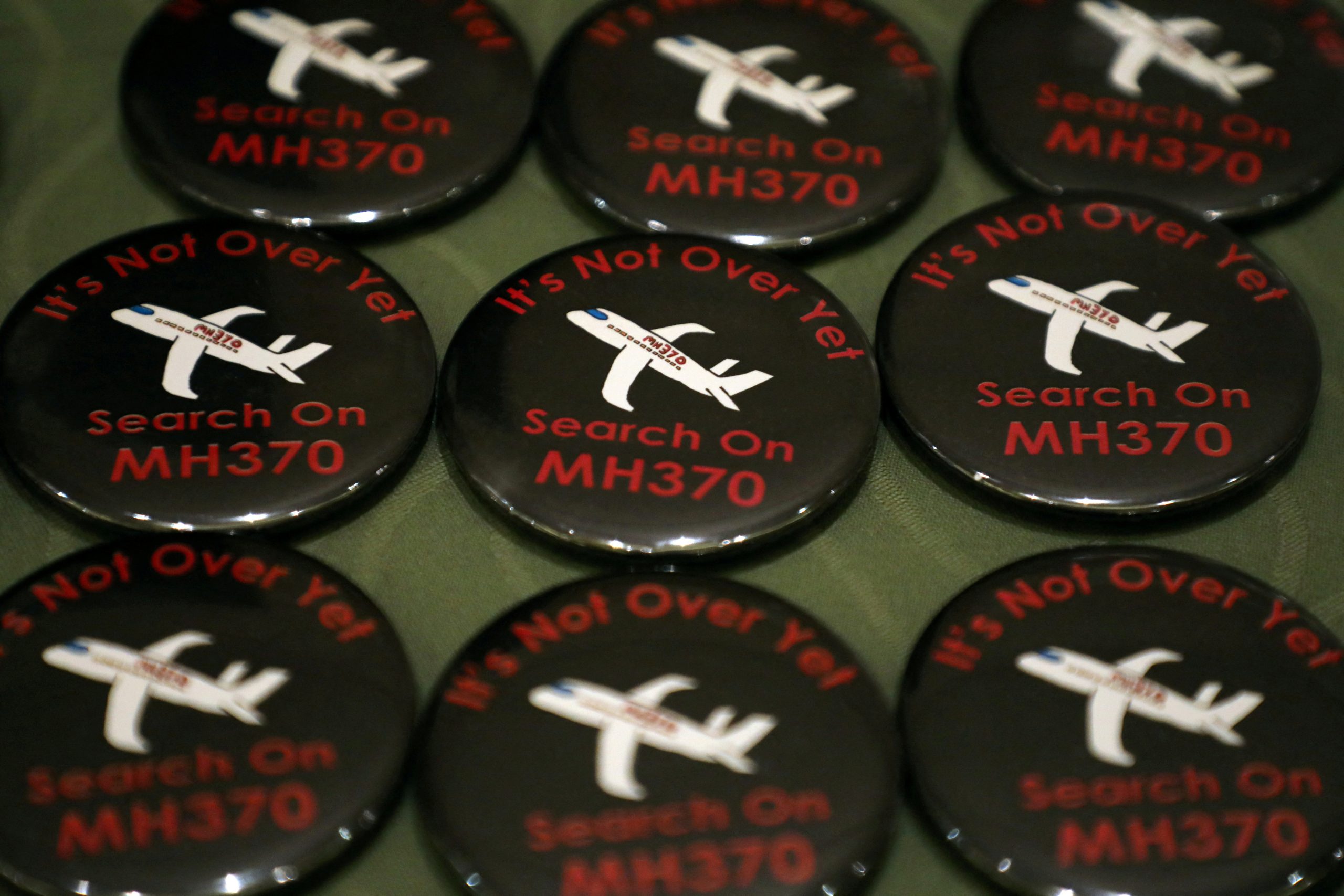 Nine years on, families urge new search for missing Malaysia plane MH370