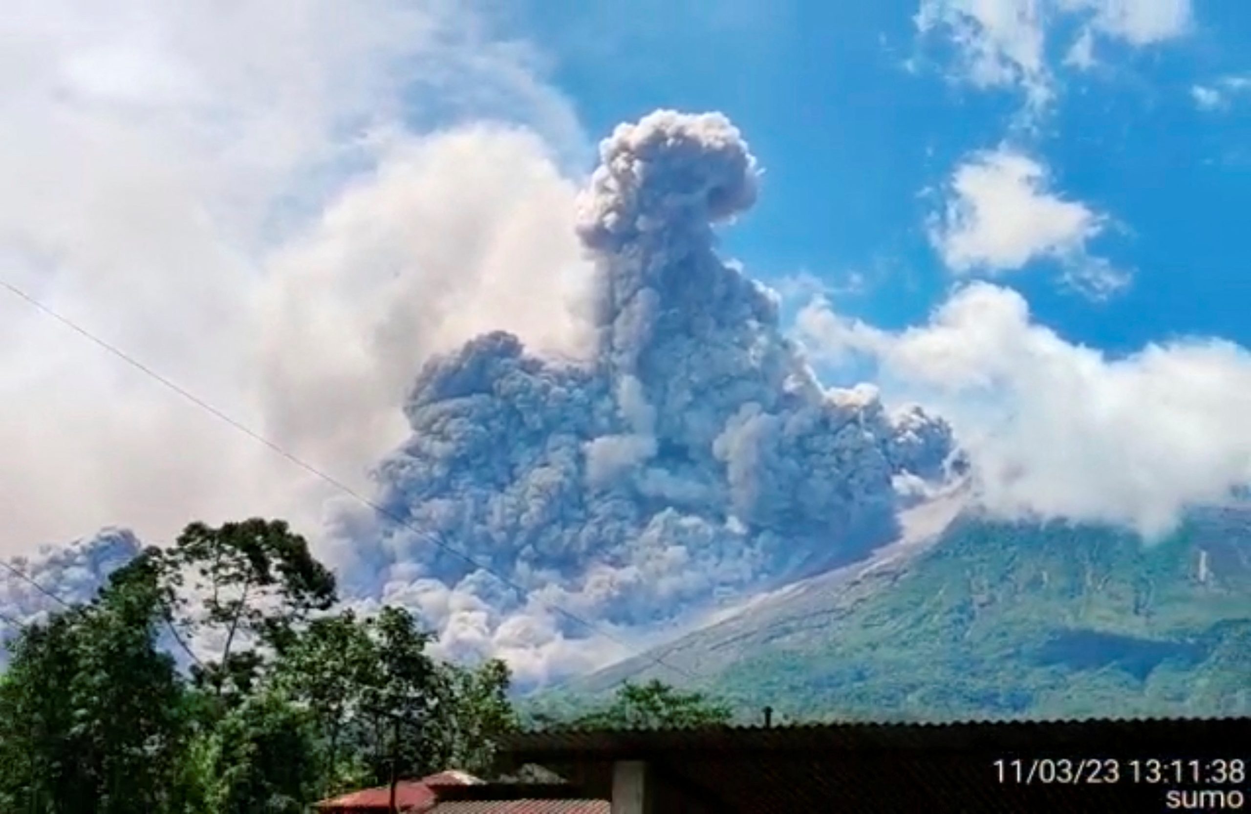 Indonesia’s Merapi volcano erupts, spews hot cloud