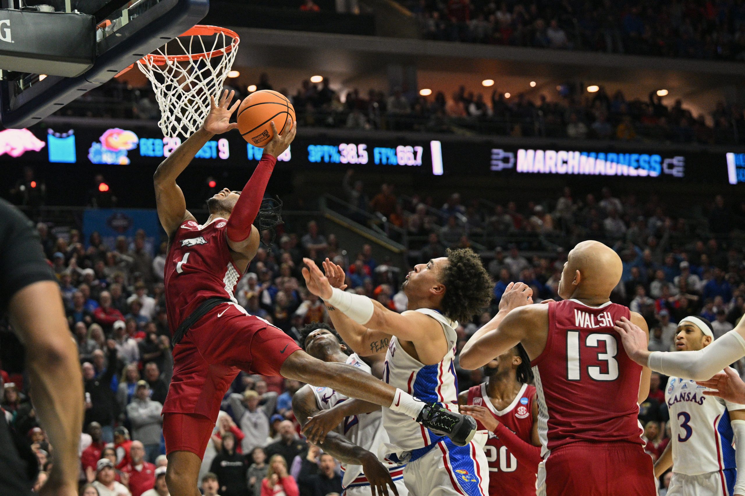 NCAA Tournament roundup: No. 8 Arkansas ousts No. 1 Kansas