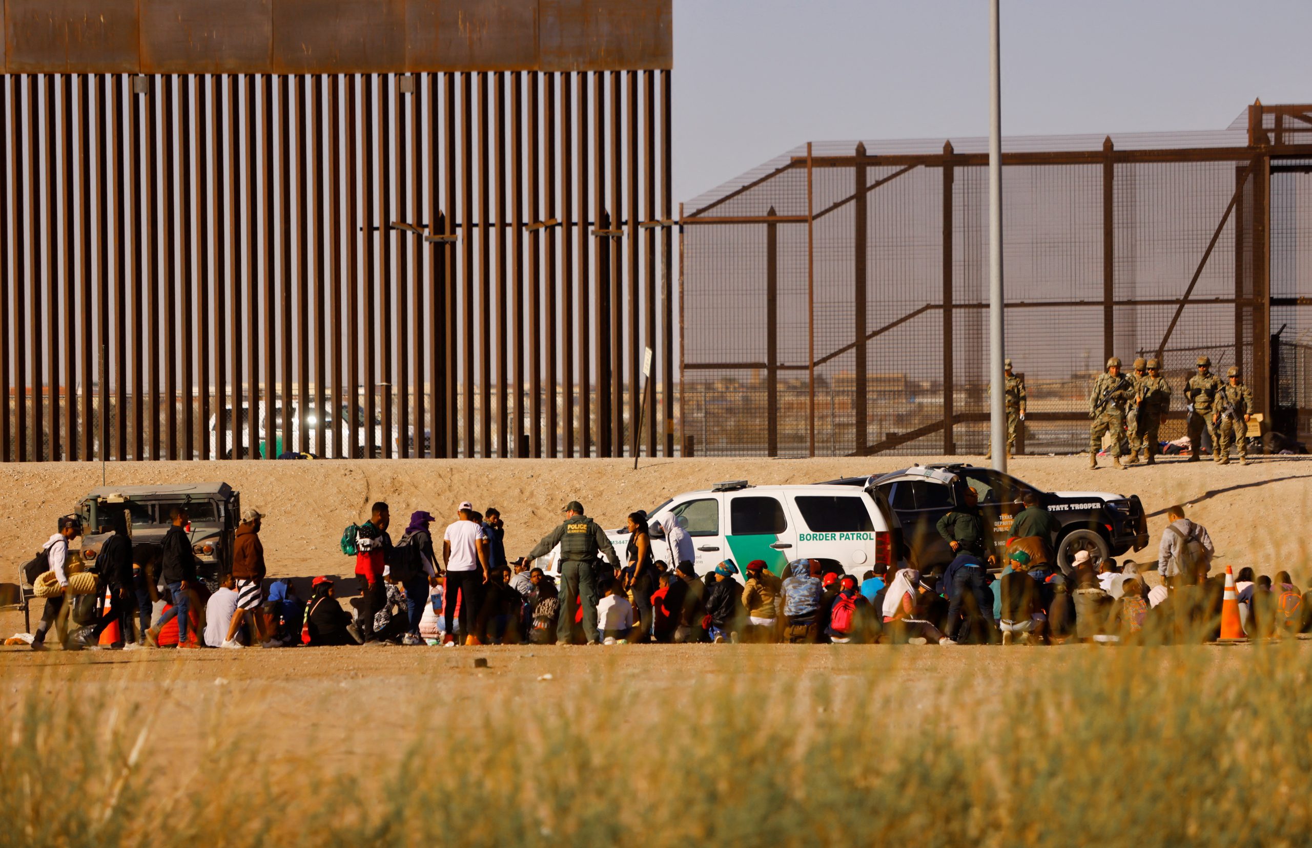 Over 1,000 migrants rush U.S.-Mexico border