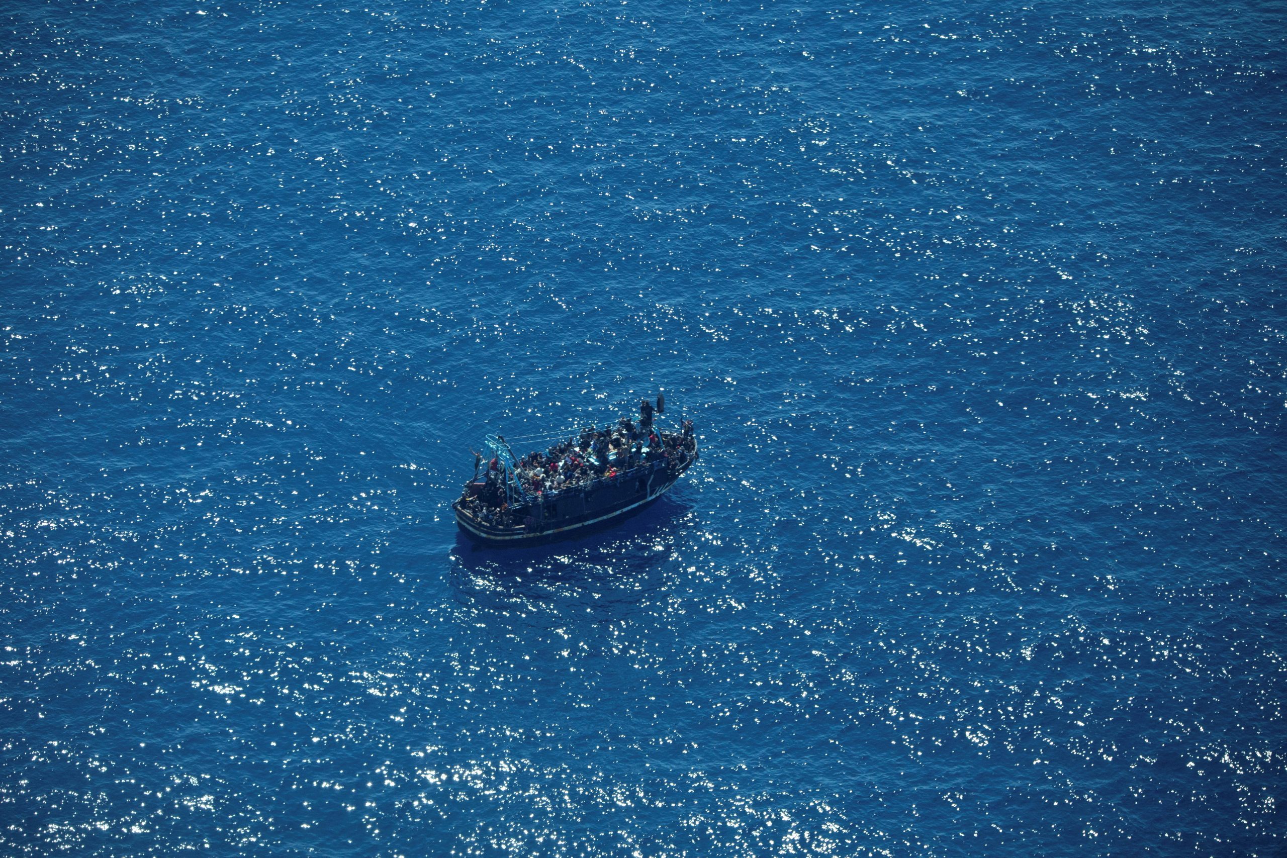 Italy’s coastguard works to rescue 1,200 migrants drifting at sea