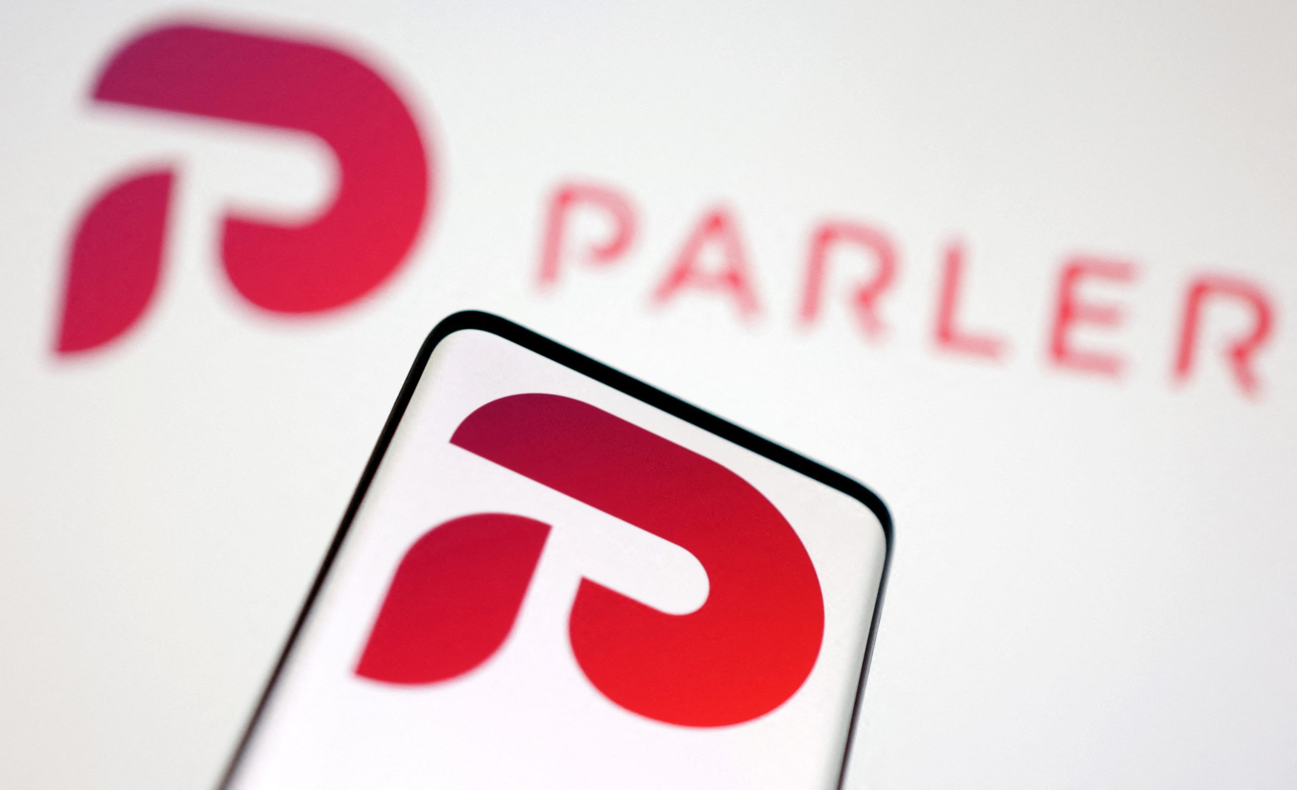 Conservative tech company buys Parler, plans temporary shutdown