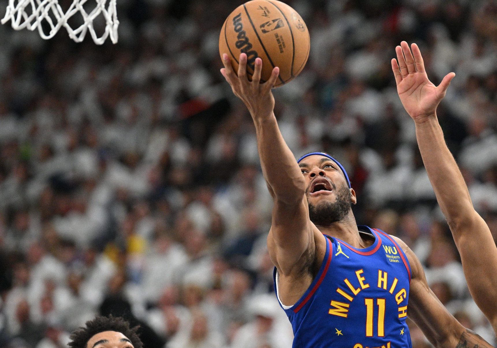 Nuggets outpace Lakers in high-scoring Game 1; Spurs win draft lottery; 76ers fire Rivers