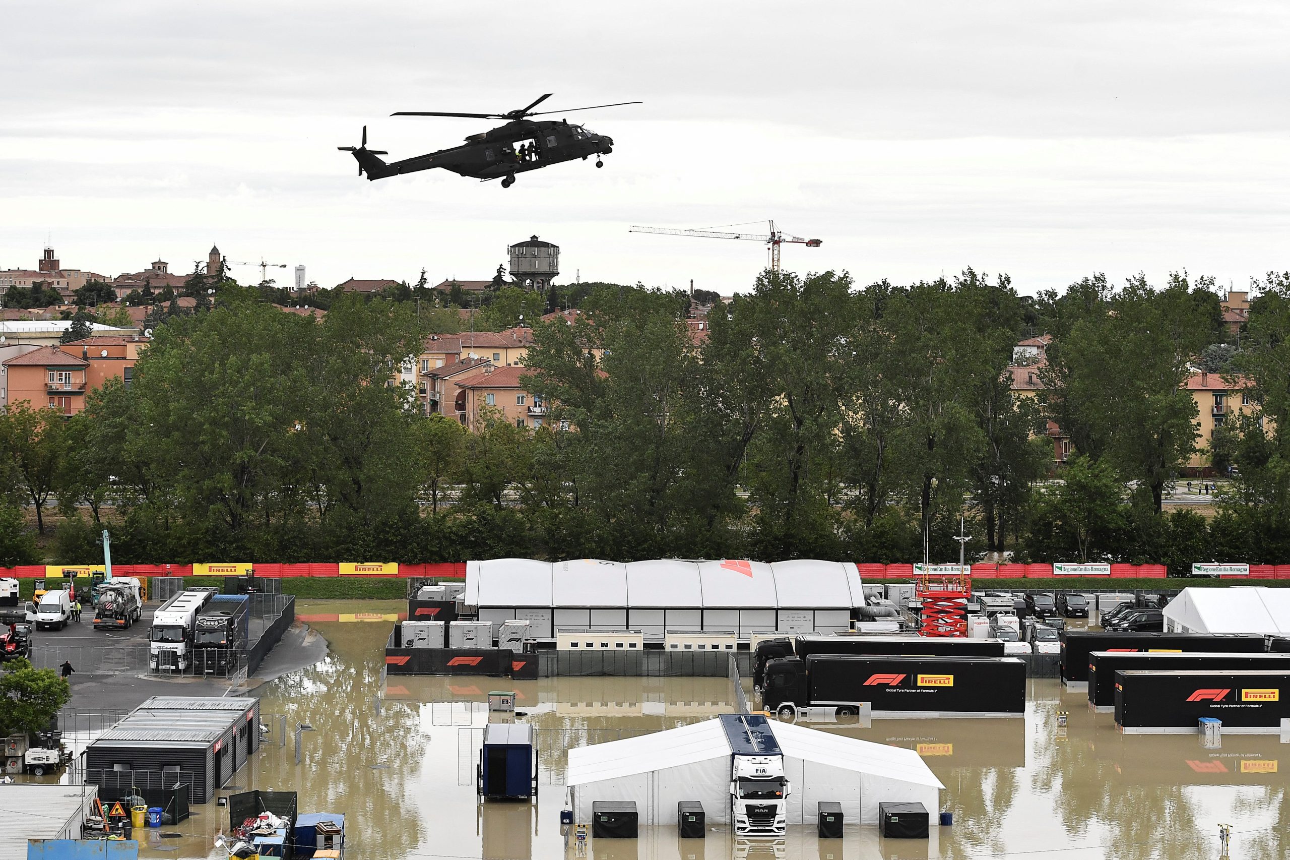 At least 8 dead in north Italy floods, Formula One race called off