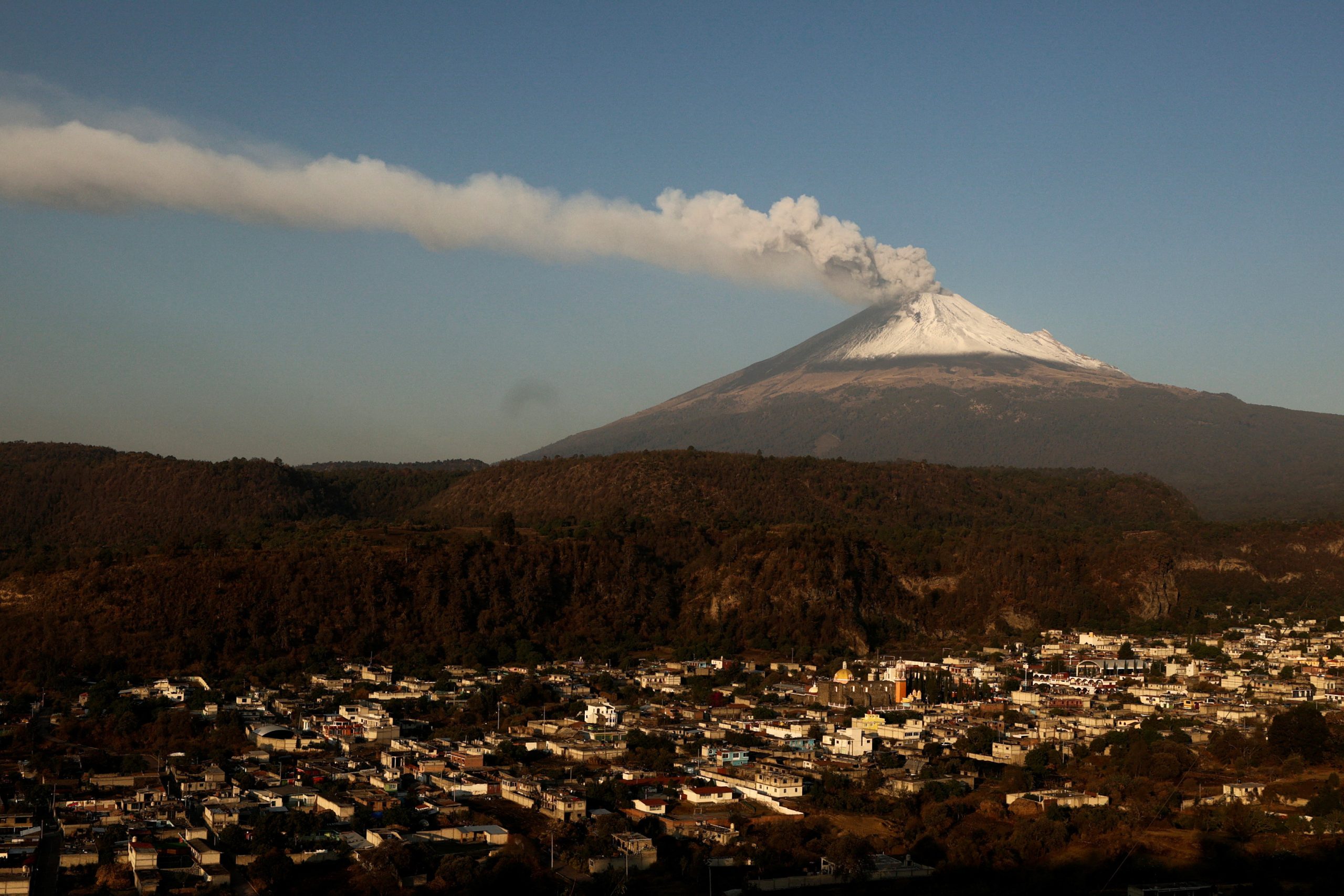 Volcanoes erupt in Mexico and Sicily, shutting down airports, schools