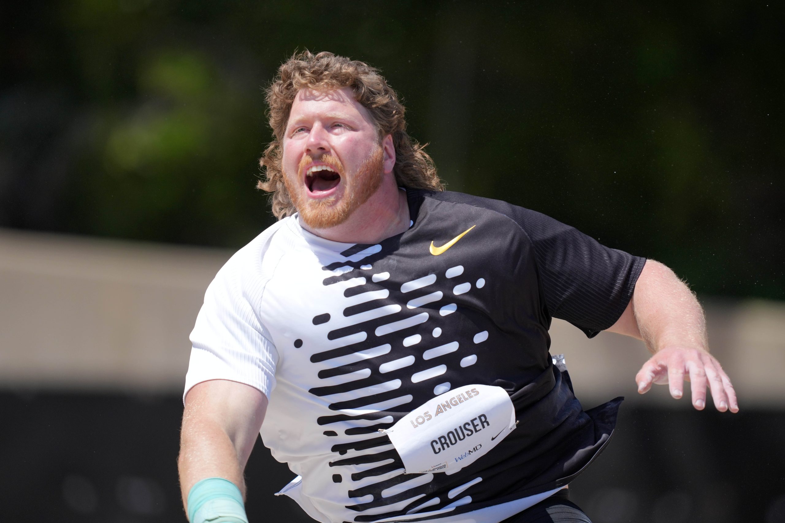 Athletics-Olympic champion Crouser shatters own shot put world record