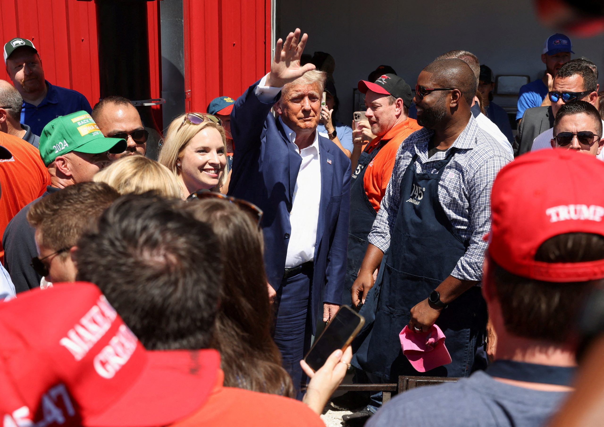 Trump makes a splash at Iowa State fair, DeSantis quietly grows support