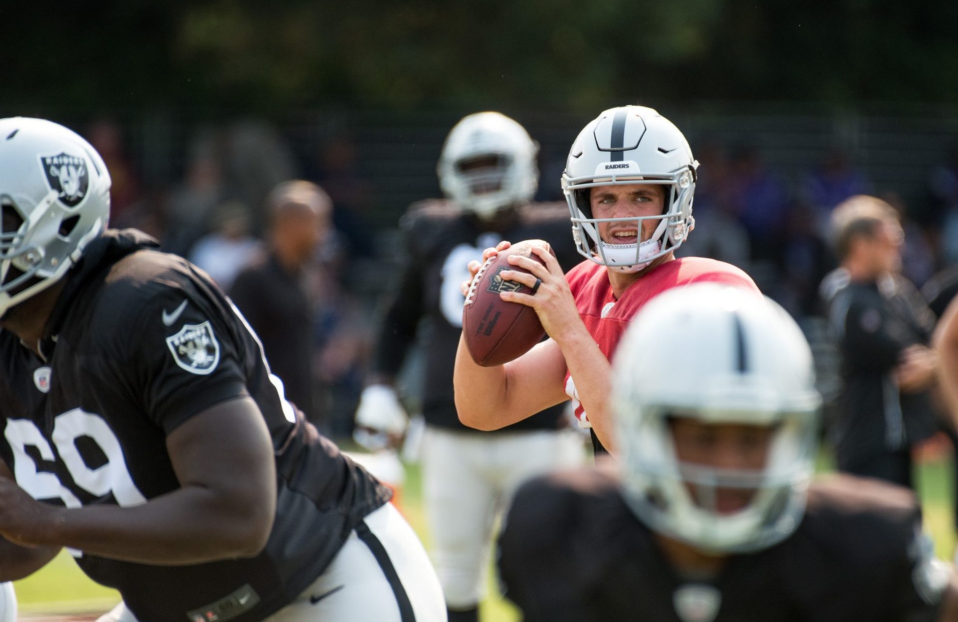 NFL moves: Derek Carr goes to Saints, Geno Smith stays with Seahawks