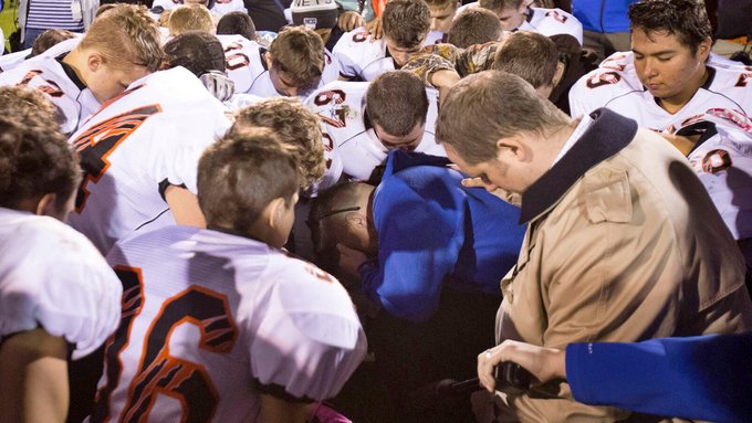 High school coach who was fired for praying returns to the field following 7-year legal battle